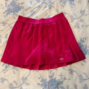 Alo Yoga Varsity Tennis Skirt in Magenta Crush